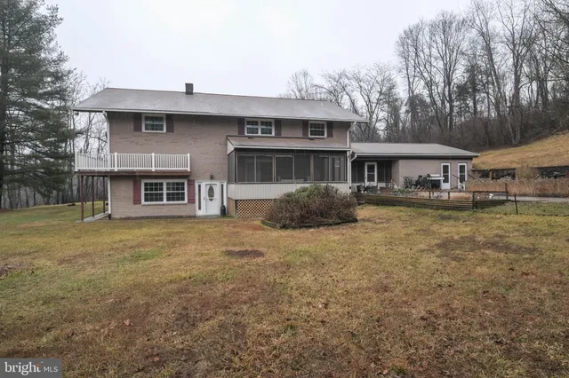 a kitchen with a counter space cabinets and appliances