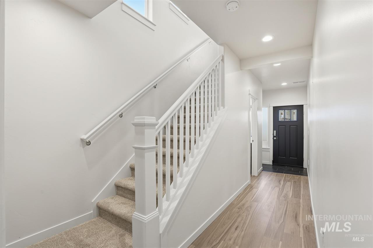 449 West Winnipeg Street Meridian, ID 83642 - Photo 24 of 49 Staircase featuring wood finished floors and recessed lighting
