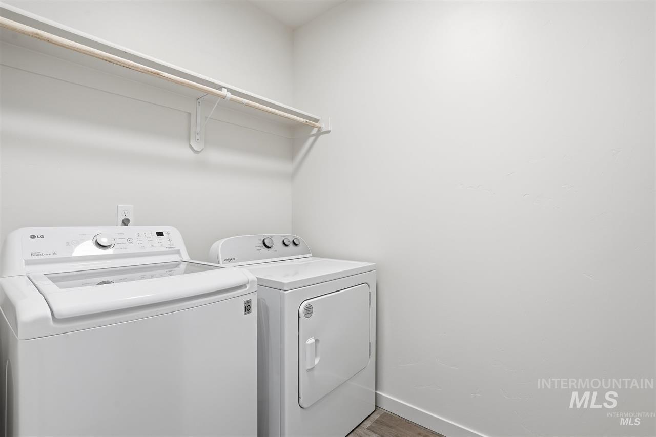 449 West Winnipeg Street Meridian, ID 83642 - Photo 34 of 49 Laundry area with wood finished floors and separate washer and dryer