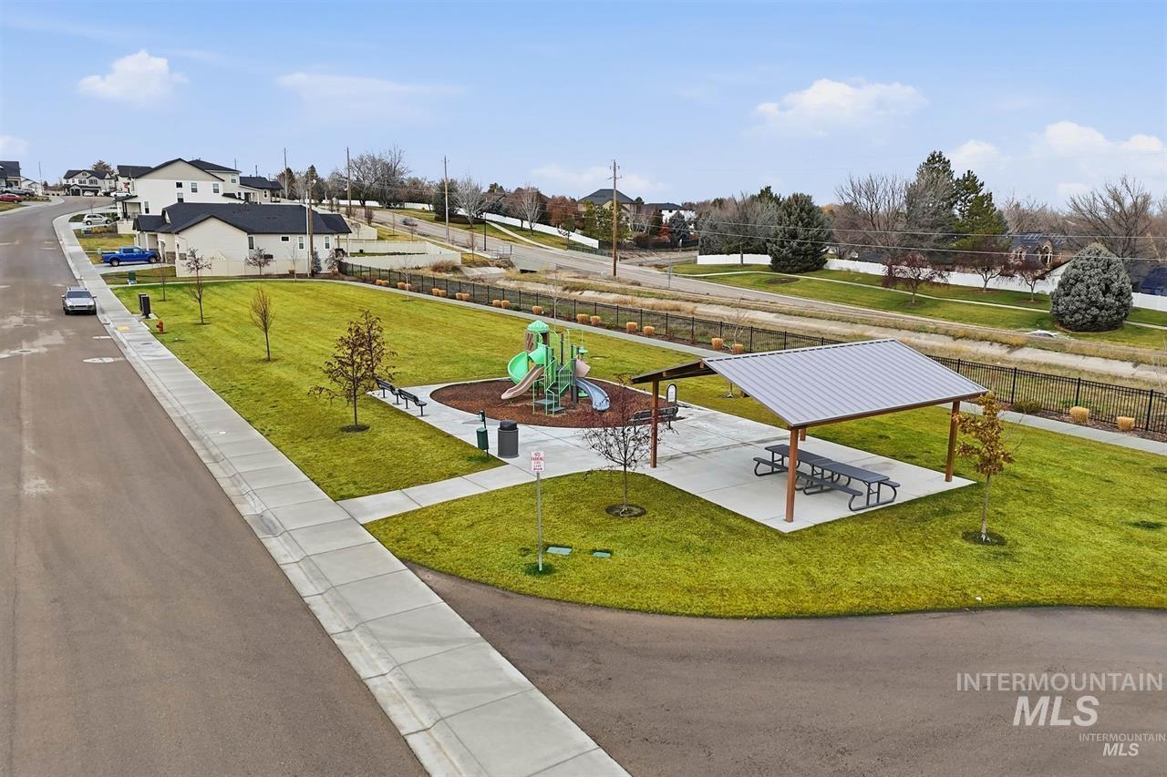 449 West Winnipeg Street Meridian, ID 83642 - Photo 49 of 49 View of home's community with a playground, a patio, a yard, and a residential view