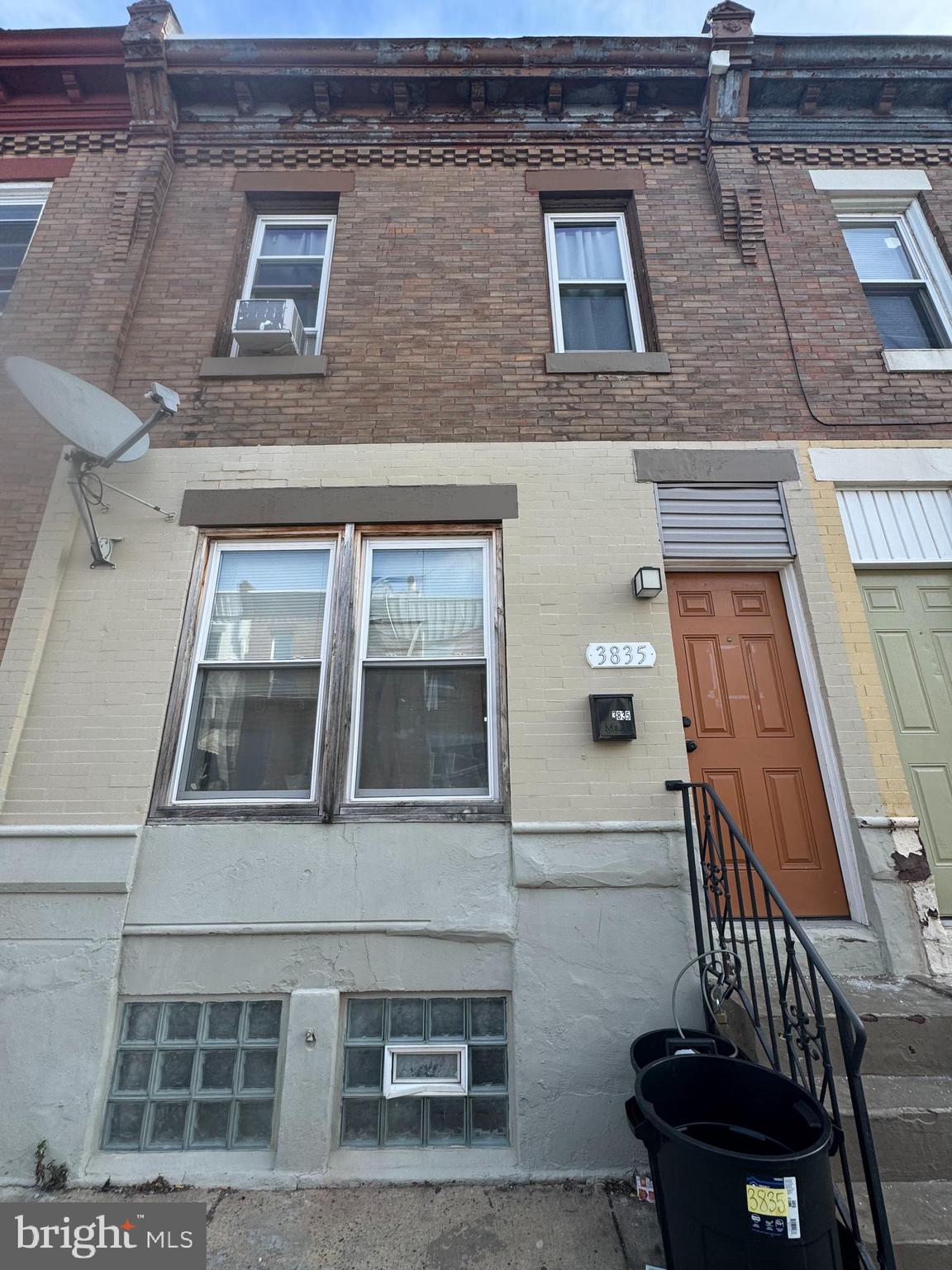 3835 North Percy Street Philadelphia, PA 19140 - Photo 1 of 7 a view of a brick house with many windows