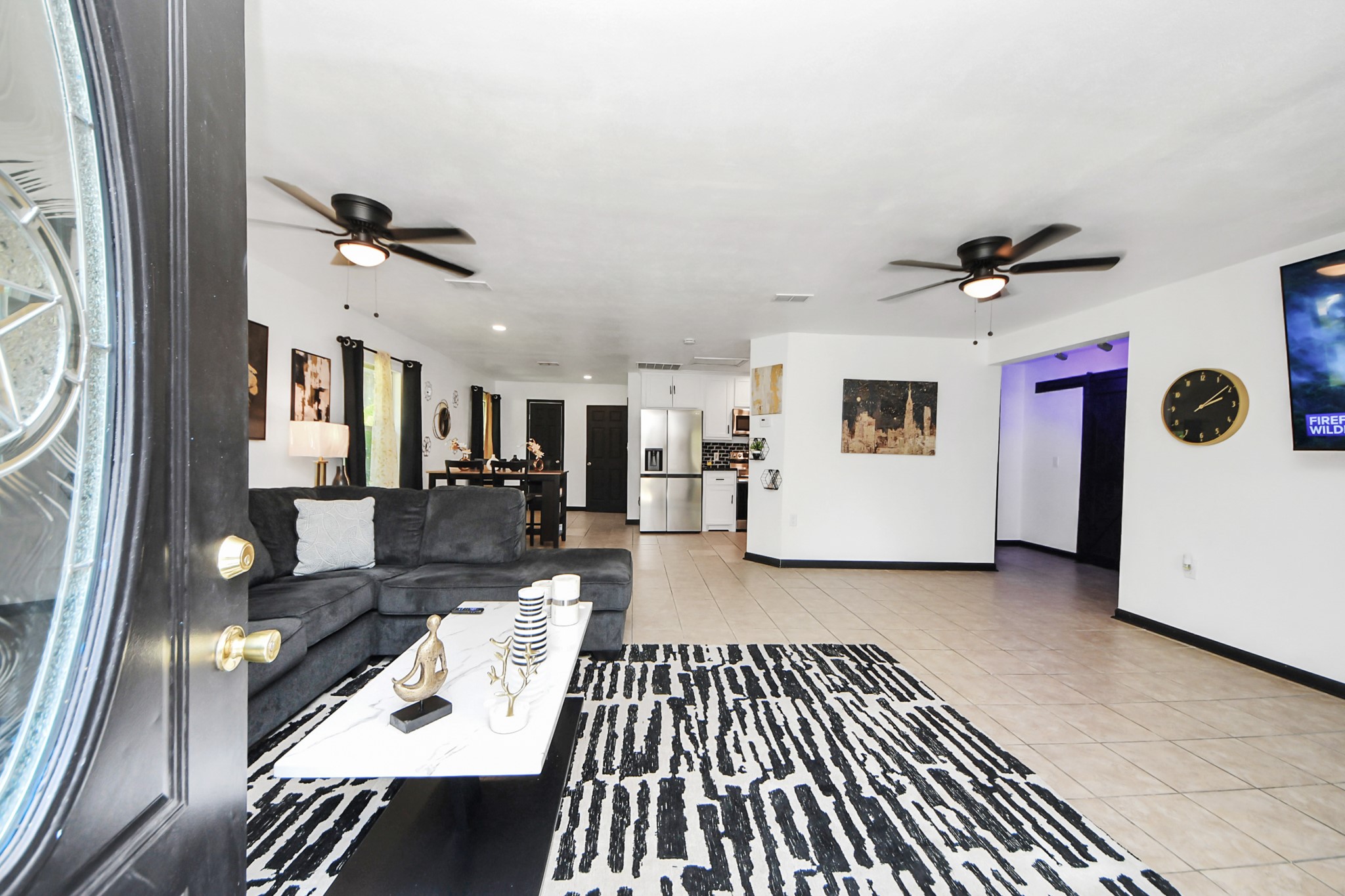 238 Waterfall Drive Huffman, TX 77336 - Photo 11 of 40 a living room with a couch and a table