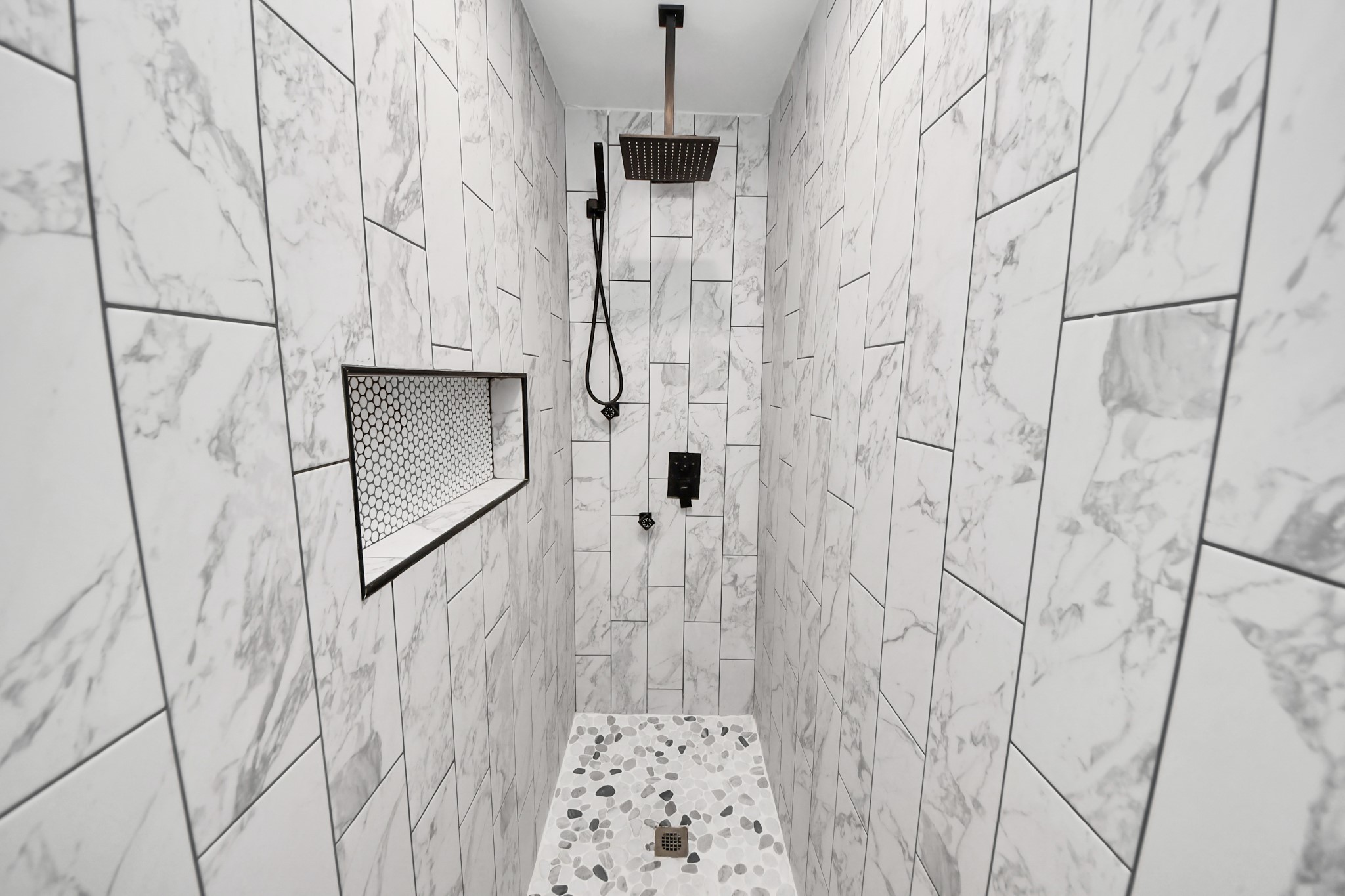 238 Waterfall Drive Huffman, TX 77336 - Photo 23 of 40 a bathroom with a shower