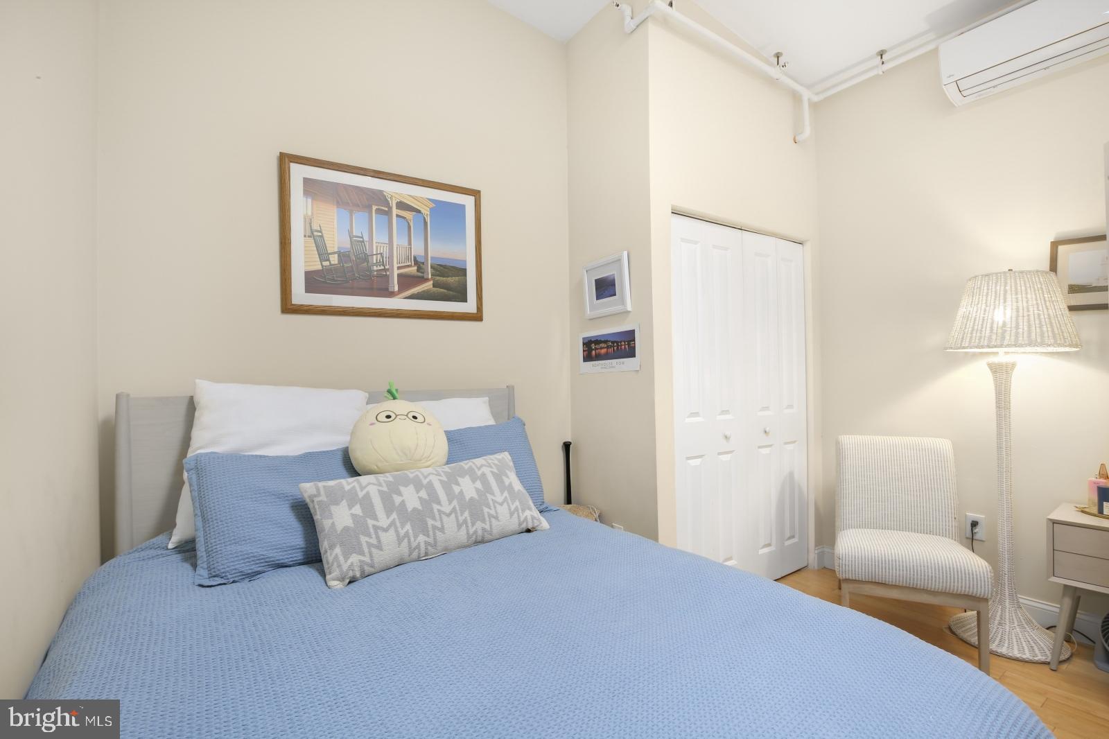 44 South 3rd Street, Unit 4R Philadelphia, PA 19106 - Photo 12 of 19 a bedroom with a bed and a couch