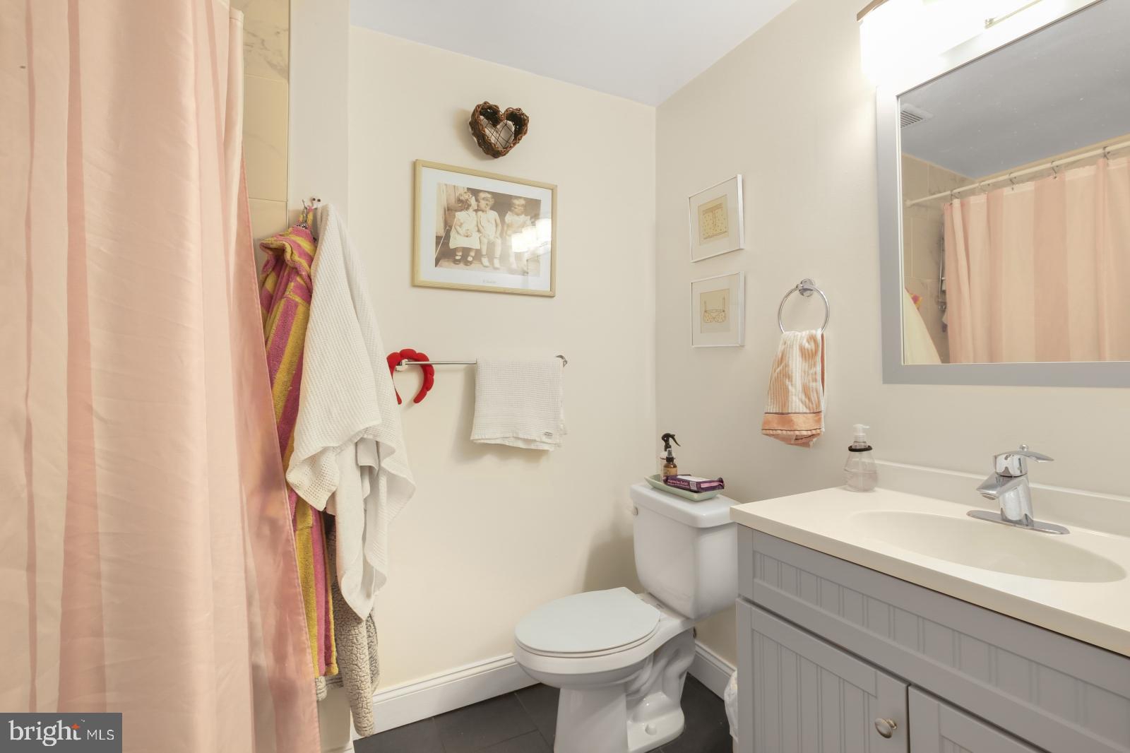 44 South 3rd Street, Unit 4R Philadelphia, PA 19106 - Photo 13 of 19 a bathroom with a sink toilet and shower