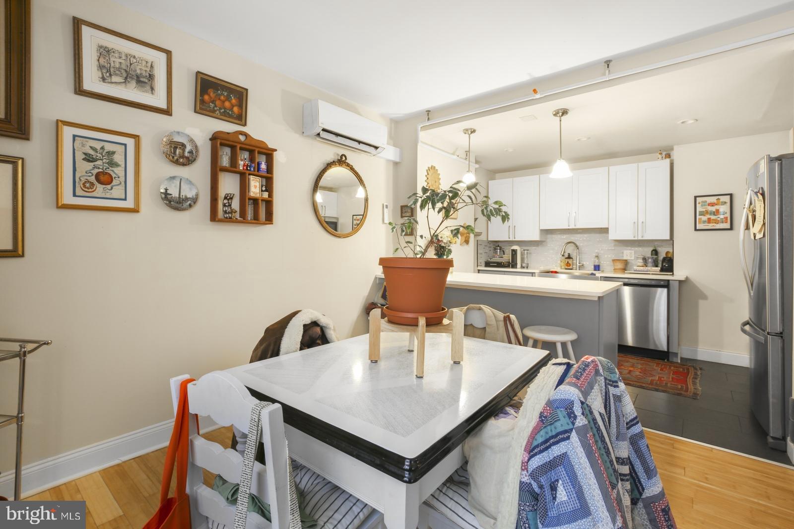 44 South 3rd Street, Unit 4R Philadelphia, PA 19106 - Photo 6 of 19 a kitchen with a table and chairs
