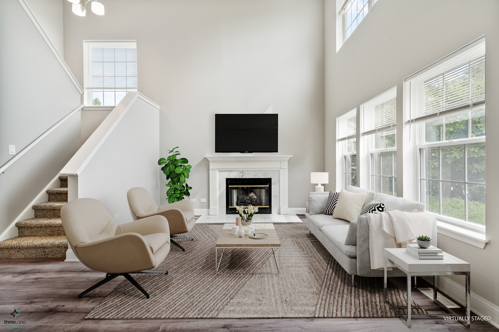 1809 Prairie Ridge Drive Plainfield, IL 60586 - Photo 12 of 32 a living room with furniture a fireplace and a floor to ceiling window