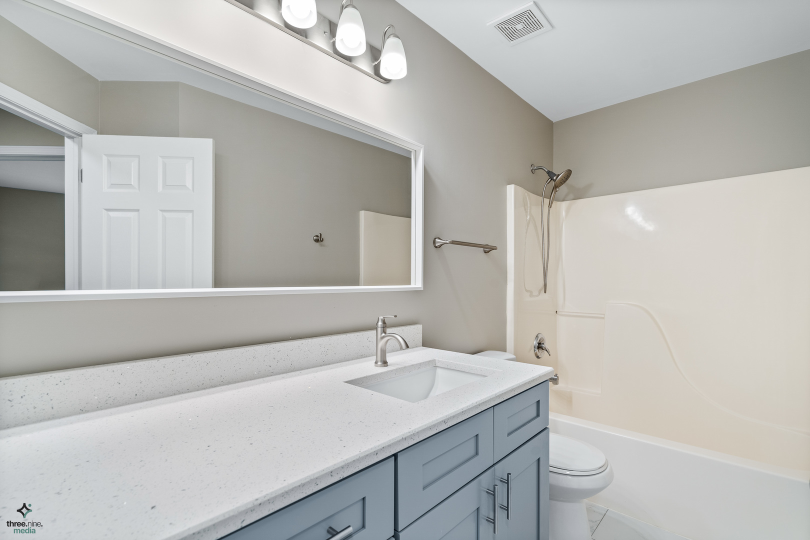 1809 Prairie Ridge Drive Plainfield, IL 60586 - Photo 22 of 32 a bathroom with a granite countertop sink a toilet and a mirror