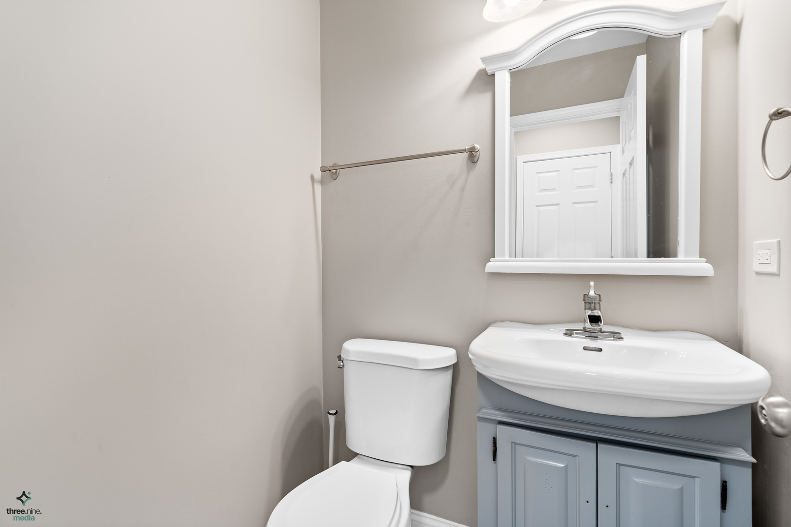 1809 Prairie Ridge Drive Plainfield, IL 60586 - Photo 24 of 32 a bathroom with a toilet sink and mirror