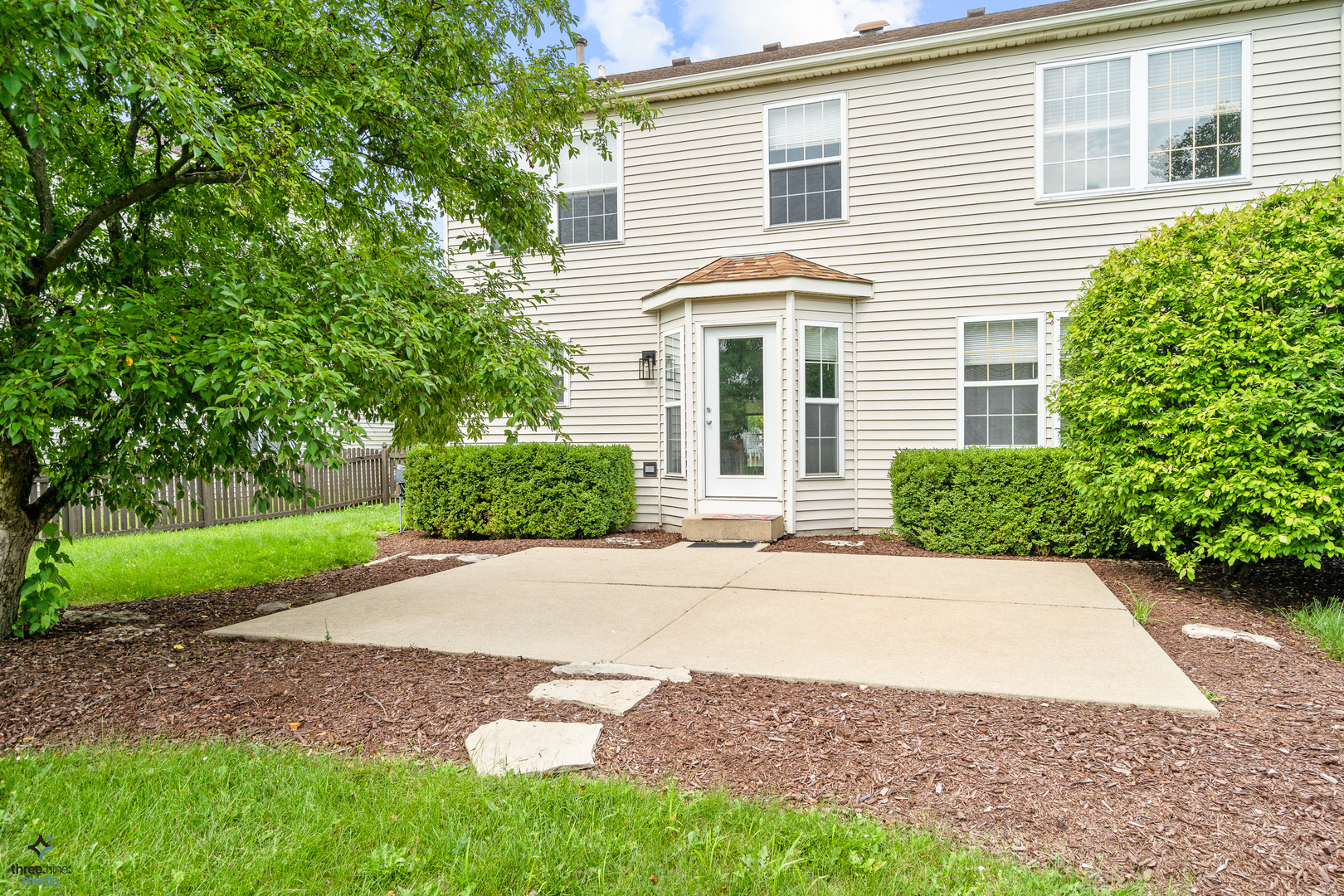 1809 Prairie Ridge Drive Plainfield, IL 60586 - Photo 26 of 32 a front view of a house with a yard and a garage