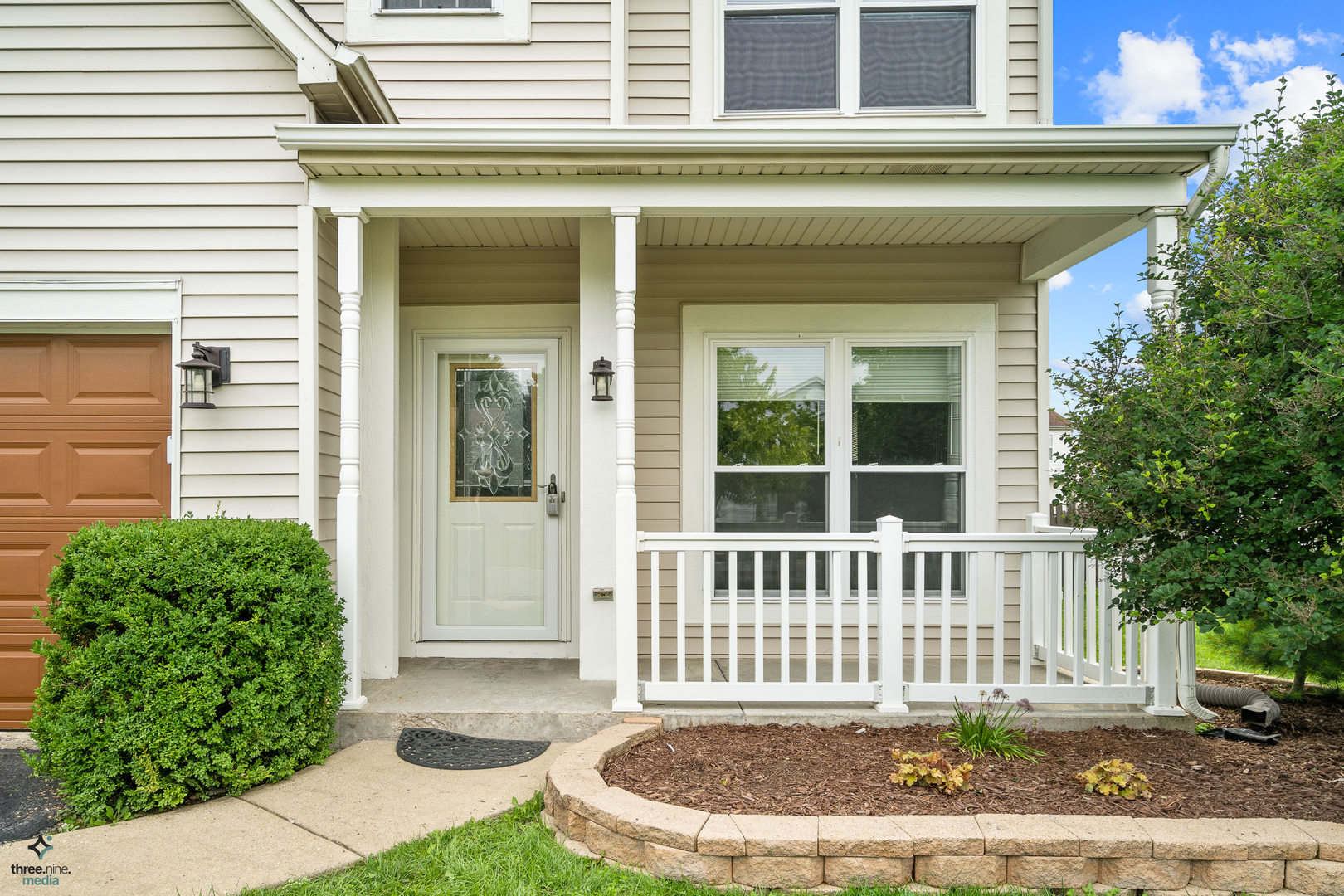 1809 Prairie Ridge Drive Plainfield, IL 60586 - Photo 29 of 32 a front view of a house with a garden