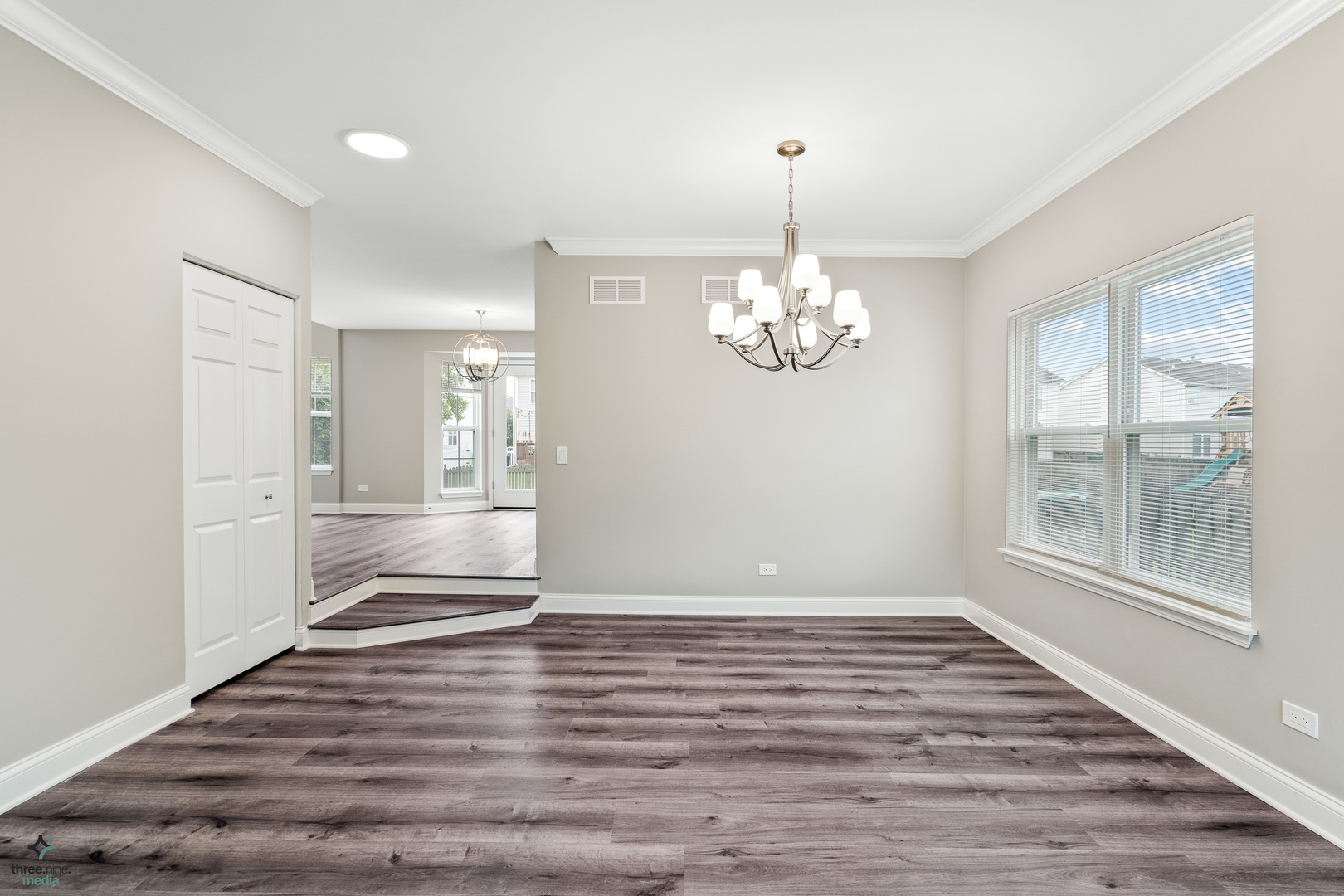 1809 Prairie Ridge Drive Plainfield, IL 60586 - Photo 7 of 32 wooden floor in an empty room with a window