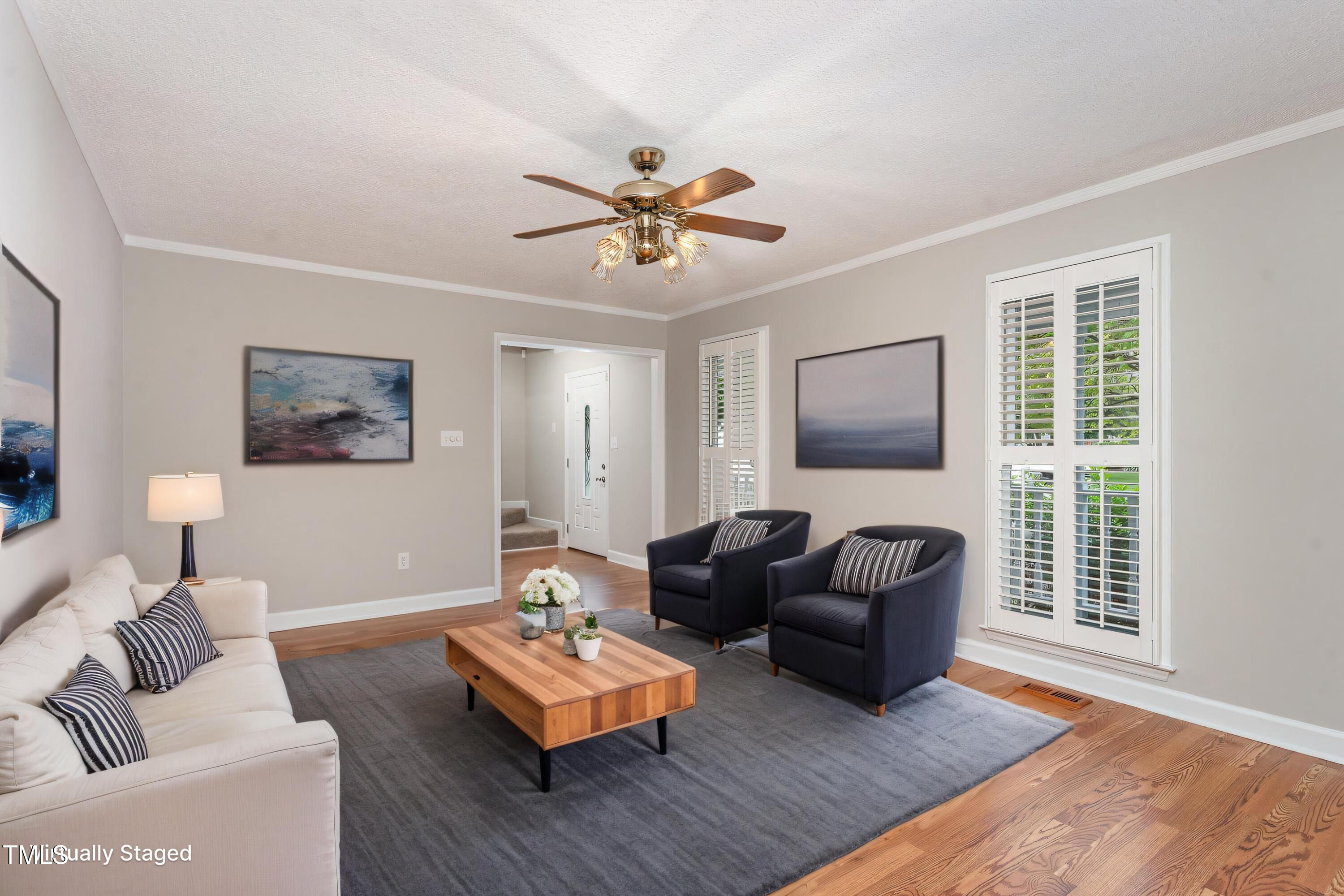 5033 Knightsbridge Way Raleigh, NC 27604 - Photo 6 of 40 a living room with furniture and a window