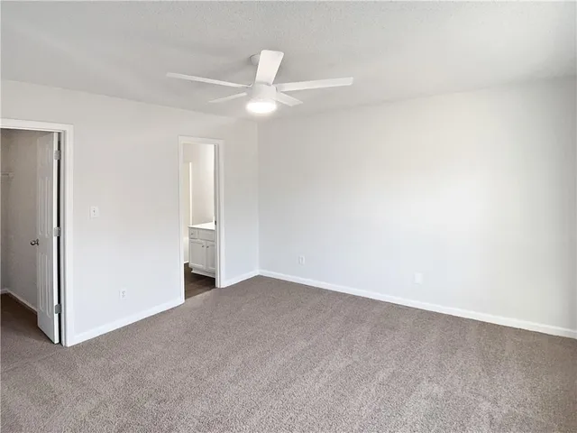 an empty room with a bathroom