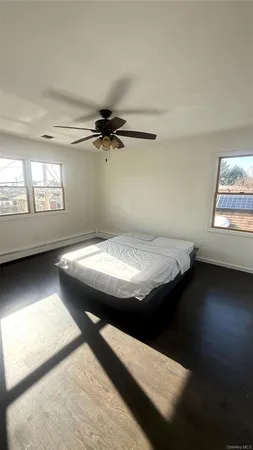 a view of livingroom and hardwood floor