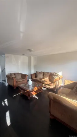 a view of a livingroom with furniture
