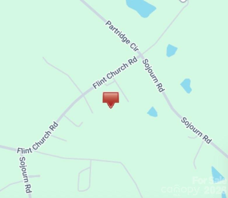 5606 Flint Ridge Marshville, NC 28103 - Photo 5 of 5 a bathroom with a tub and shower