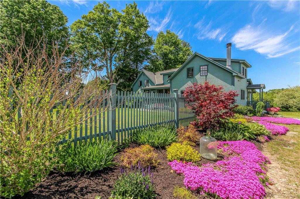 10 Wadlin Road Biddeford, ME 04005 - Photo 4 of 35 Gorgeous gardens and lawns on this...