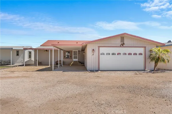 a front view of a building with a garage