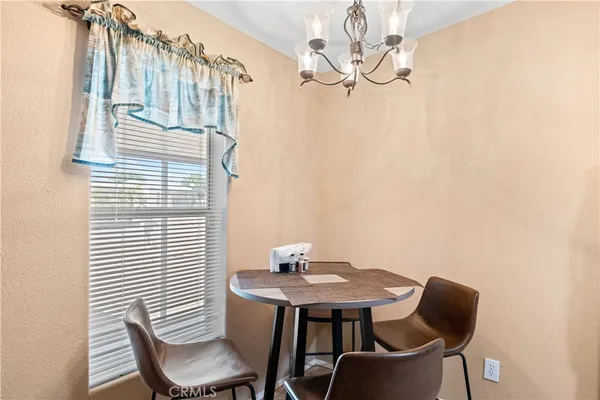 a view of a dining room with furniture