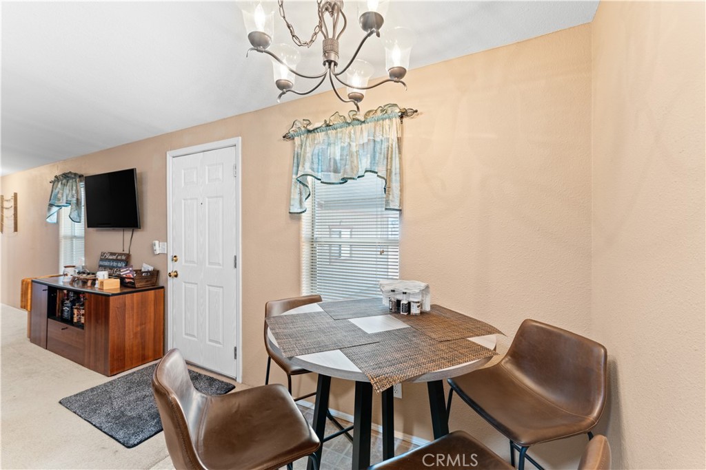 5900 Colorado River Road, Unit 18 Blythe, CA 92225 - Photo 12 of 58 a view of a dining room with furniture