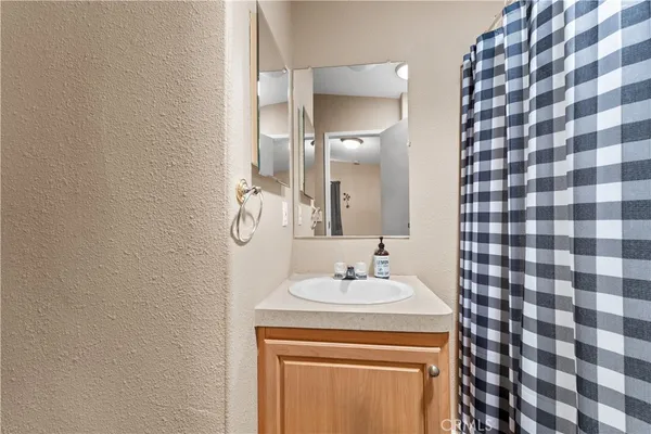 a bathroom with a bathtub and shower