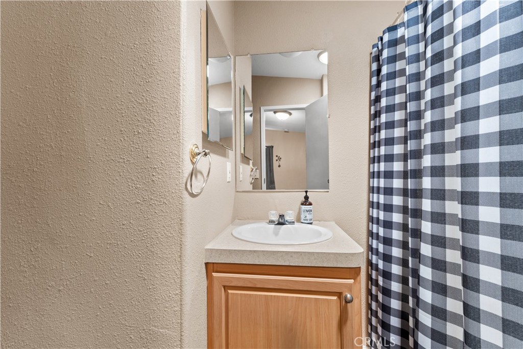 5900 Colorado River Road, Unit 18 Blythe, CA 92225 - Photo 22 of 58 a bathroom with a sink a toilet and shower