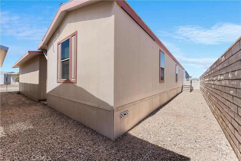 5900 Colorado River Road, Unit 18 Blythe, CA 92225 - Photo 30 of 58 a view of a house with a backyard