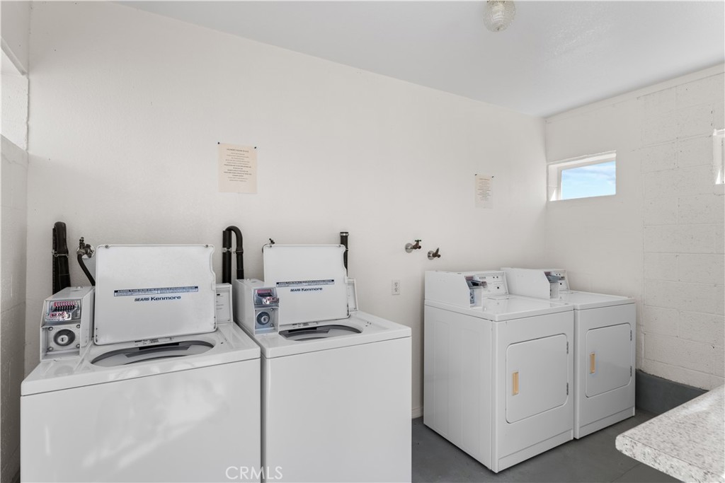 5900 Colorado River Road, Unit 18 Blythe, CA 92225 - Photo 37 of 58 a view of storage and utility room with washer and dryer