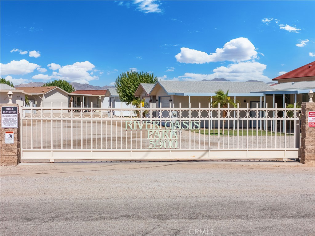 5900 Colorado River Road, Unit 18 Blythe, CA 92225 - Photo 38 of 58 a view of a house in a yard and front view of a house