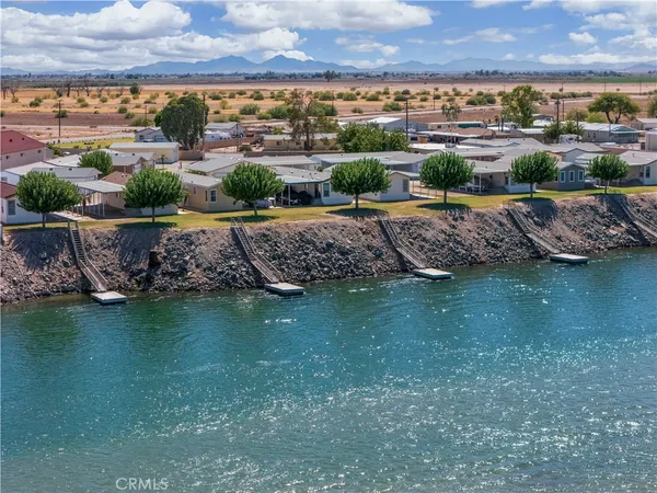 a view of a houses with a lake view