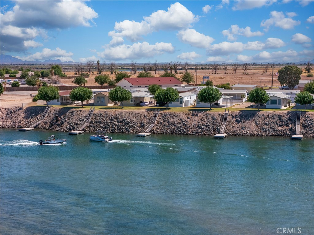 5900 Colorado River Road, Unit 18 Blythe, CA 92225 - Photo 49 of 58 a view of a lake with houses
