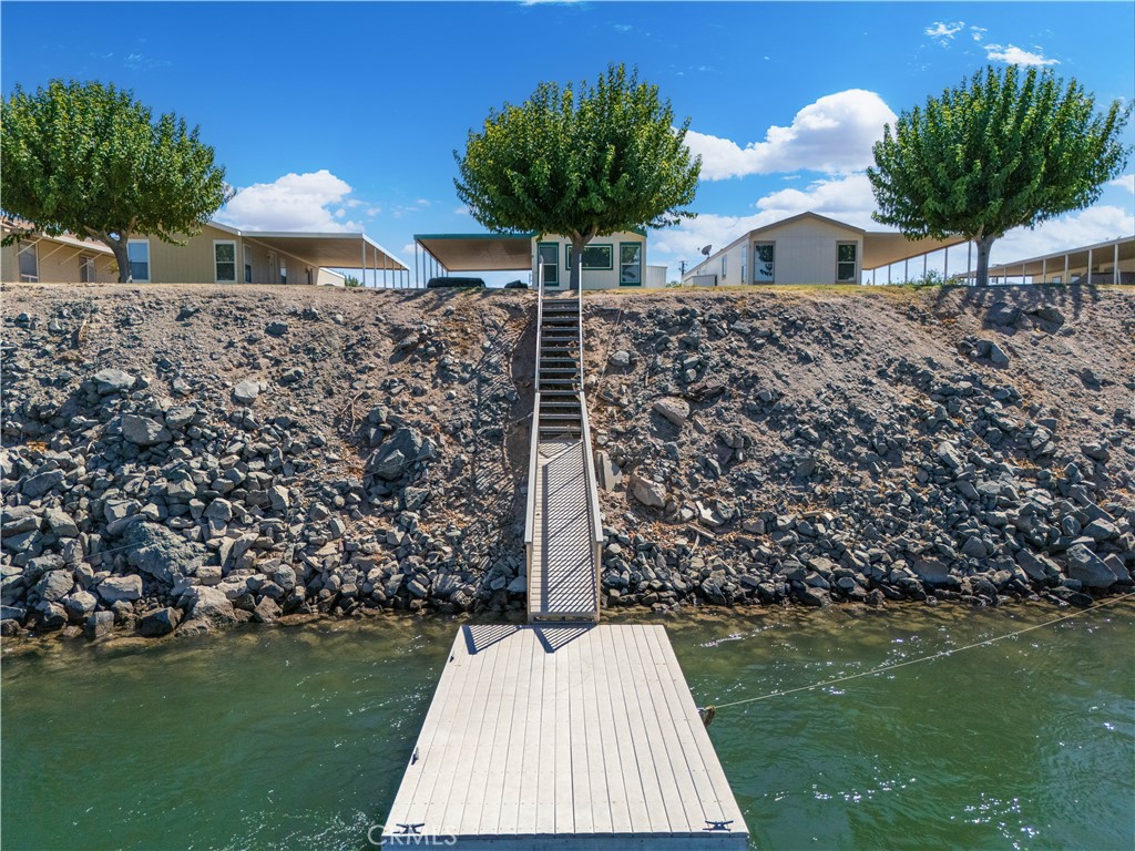 5900 Colorado River Road, Unit 18 Blythe, CA 92225 - Photo 58 of 58 a front view of a house with a yard