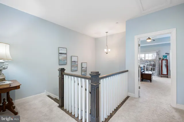 a bedroom with bed and flat screen tv