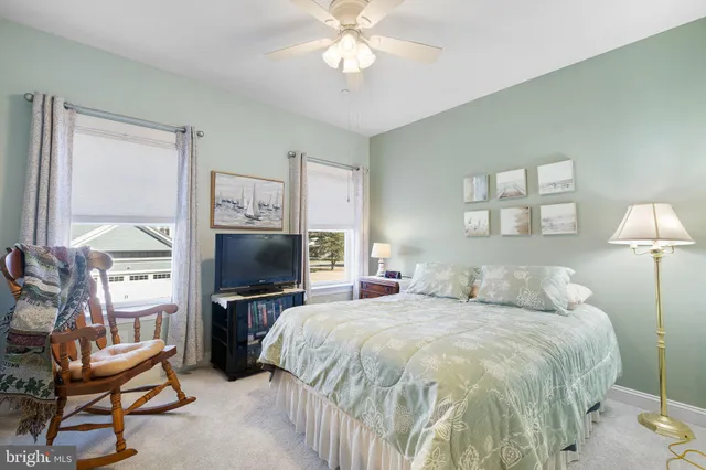an aerial view of residential building and ocean view