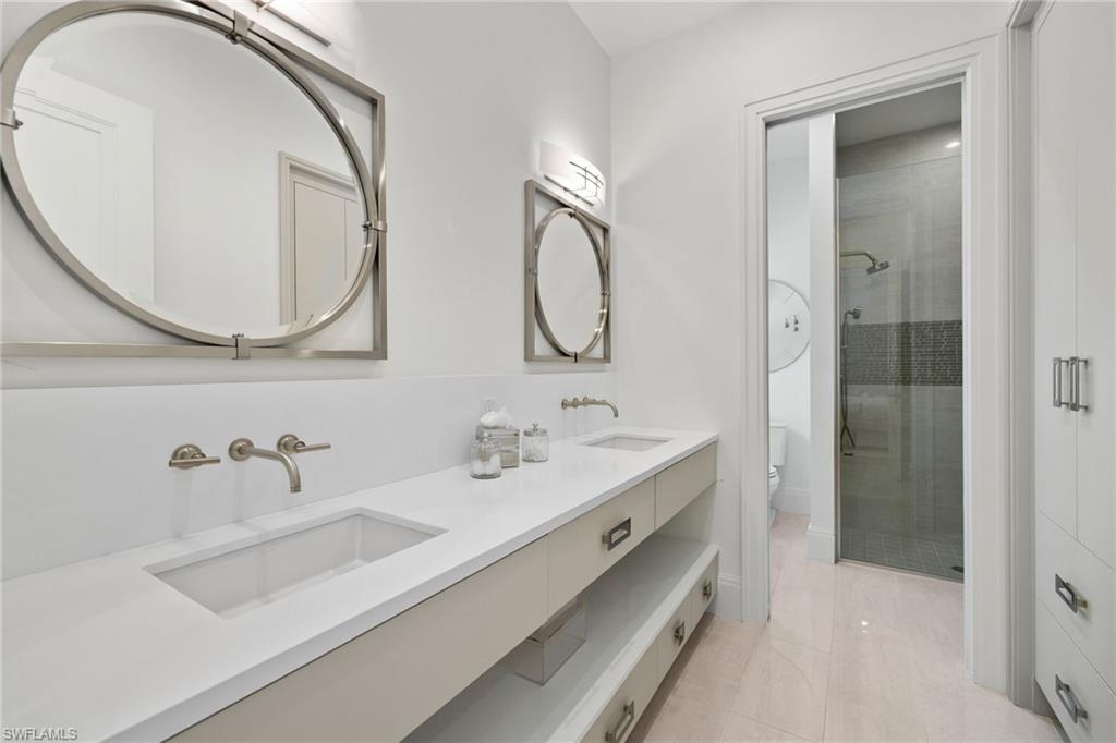 745 Riviera Drive Naples, FL 34103 - Photo 19 of 38 Downstairs guest bathroom