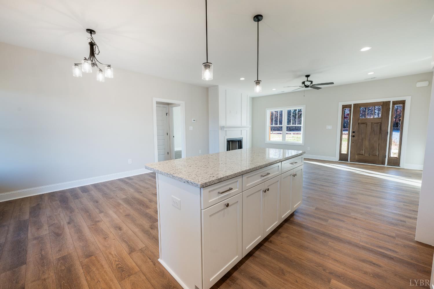 10402 Leesville Road Lynch Station, VA 24571 - Photo 11 of 45 a large kitchen with granite countertop a large counter top space a sink appliances and cabinets