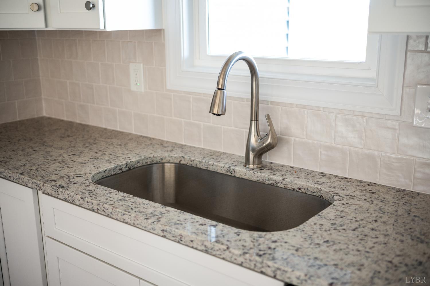 10402 Leesville Road Lynch Station, VA 24571 - Photo 15 of 45 a kitchen with a sink and bathtub