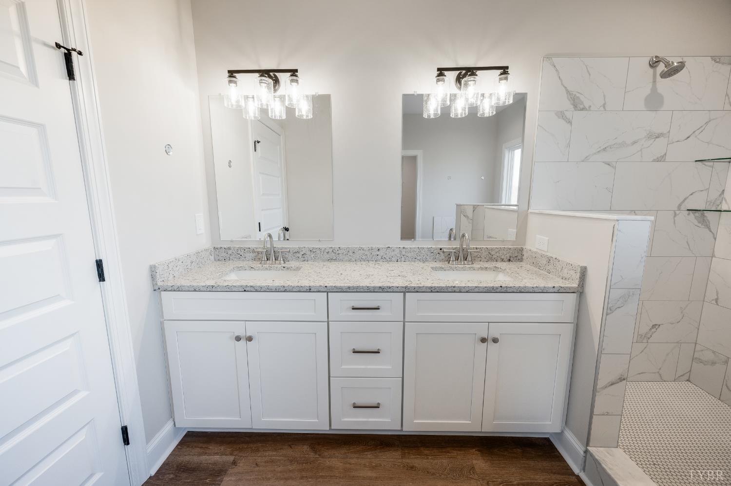 10402 Leesville Road Lynch Station, VA 24571 - Photo 25 of 45 a bathroom with a granite countertop sink and a mirror