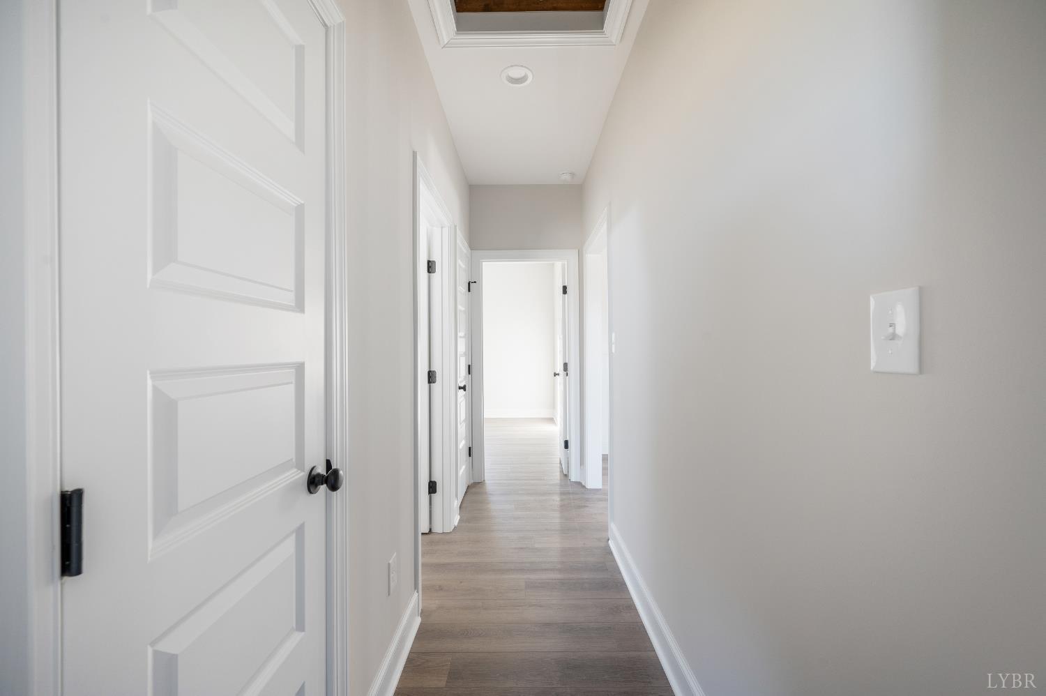 10402 Leesville Road Lynch Station, VA 24571 - Photo 36 of 45 a view of a hallway with wooden floor