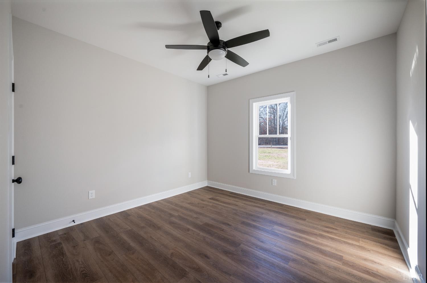 10402 Leesville Road Lynch Station, VA 24571 - Photo 37 of 45 a view of a room with a window and a ceiling fan