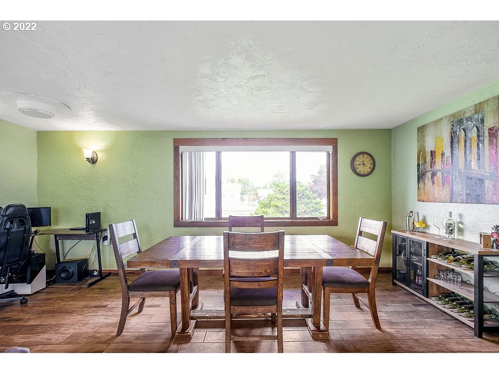 581 36th Street Springfield, OR 97478 - Photo 5 of 32 a view of a dining room with furniture and a large window