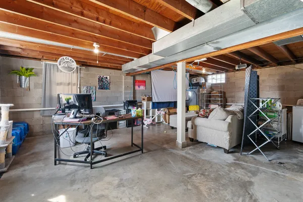 a view of a storage room with furniture