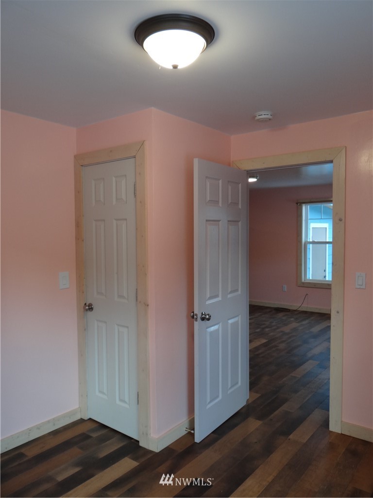 1306 Riverside Avenue Twisp, WA 98856 - Photo 14 of 22 wooden floor and windows in a room