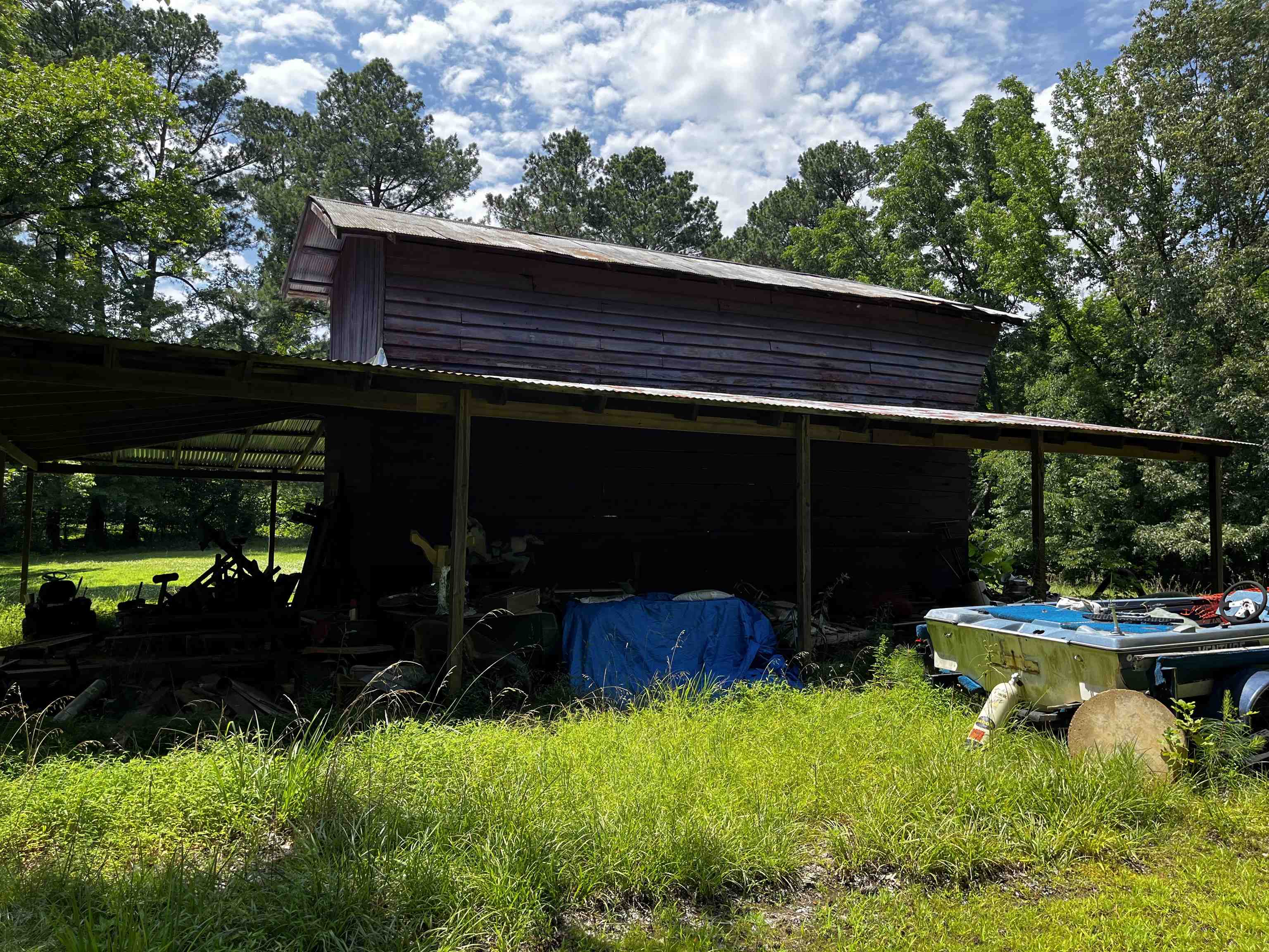 4258 Old Brownsville Road Memphis, TN 38135 - Photo 21 of 40 a backyard of a house with lots of green space