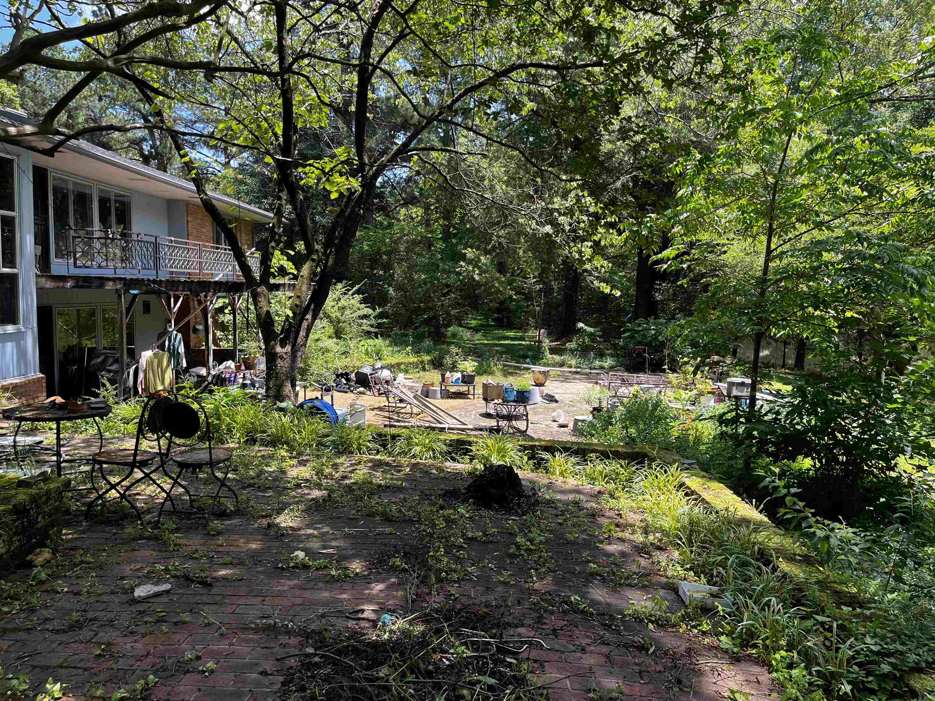 4258 Old Brownsville Road Memphis, TN 38135 - Photo 39 of 40 a view of swimming pool with lawn chairs and plants