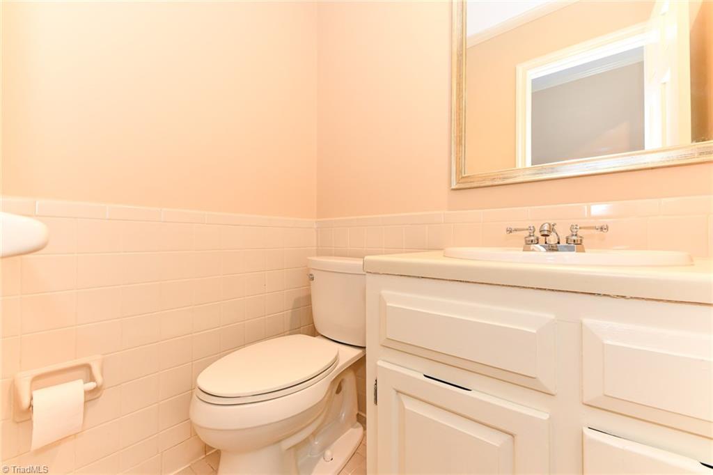 320 Homestead Avenue High Point, NC 27262 - Photo 11 of 31 This is the half bath located just off of the foyer.