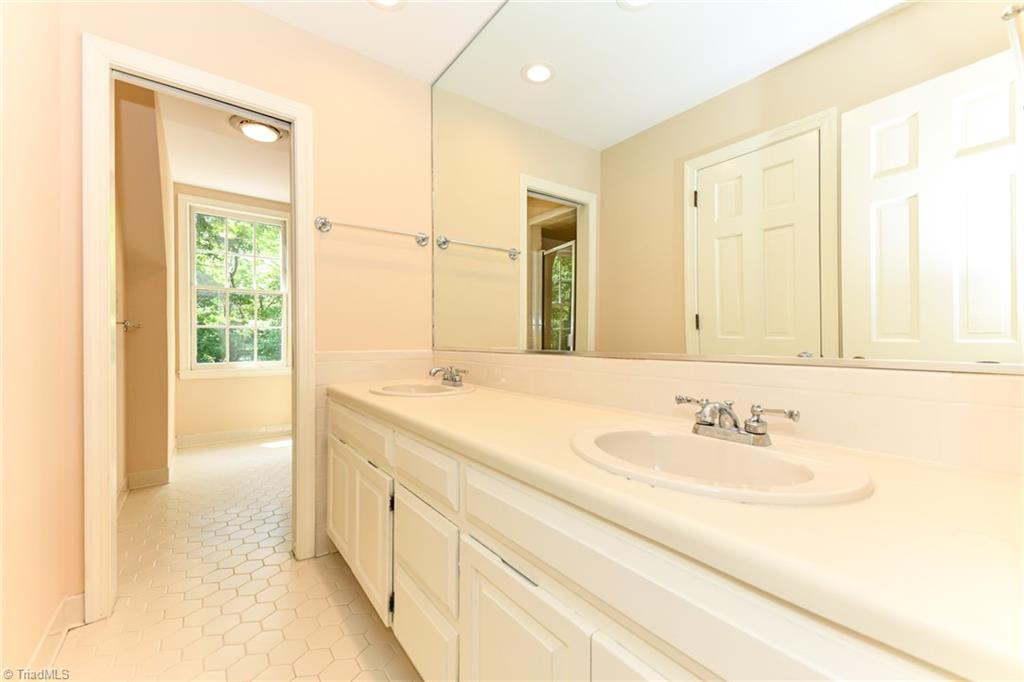 320 Homestead Avenue High Point, NC 27262 - Photo 22 of 31 Double vanities in the hall bath on the 2nd level.