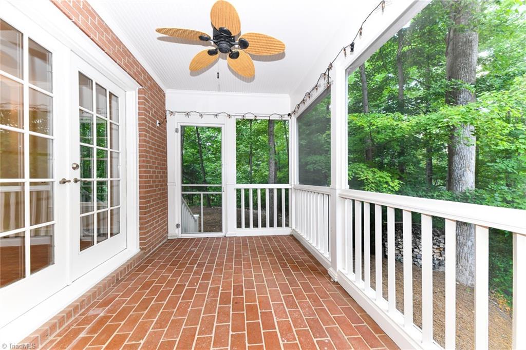 320 Homestead Avenue High Point, NC 27262 - Photo 24 of 31 The screened porch, that is located at the back of the home, allows you to relax and enjoy nature that is surrounded by your home.