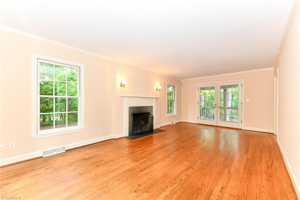 320 Homestead Avenue High Point, NC 27262 - Photo 6 of 31 Another view of the living room. This 22' x 12' has ample space for placing your furniture. The French doors lead out to a screened porch - a great space to have that morning coffee or relax at the end of the day. You will be surrounded by the sounds of nature.